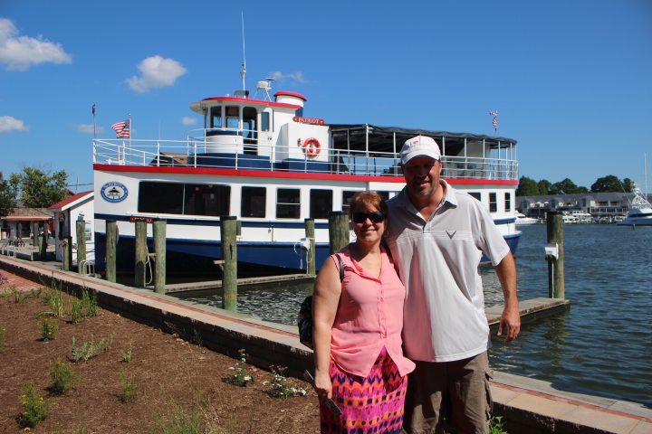 A Traveling Broad & her Dude in front of the Patriot Cruise boat